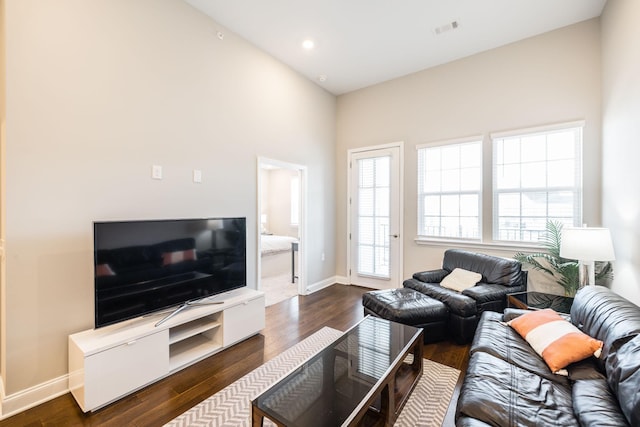 living room with dark wood-type flooring