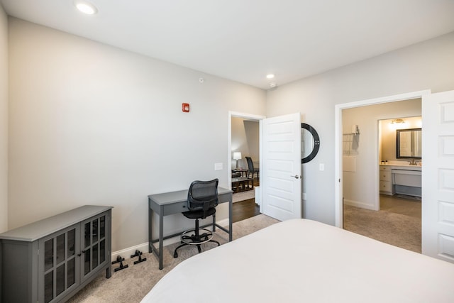 bedroom with light carpet