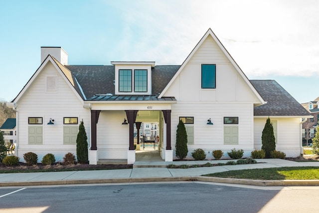 modern inspired farmhouse with a porch