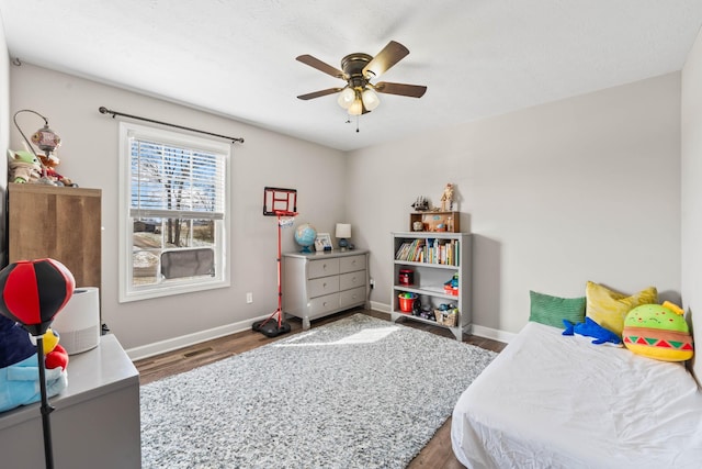 bedroom featuring hardwood / wood-style floors and ceiling fan