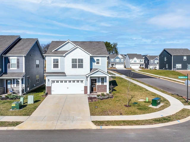 view of front facade with a garage and a front lawn