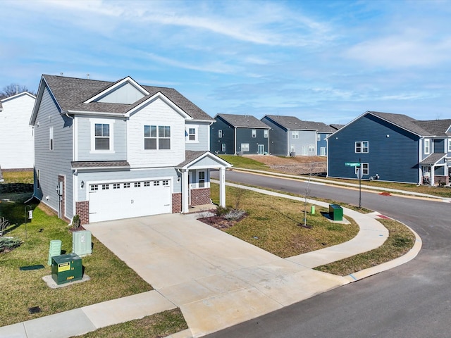 view of front of house with a garage and a front yard