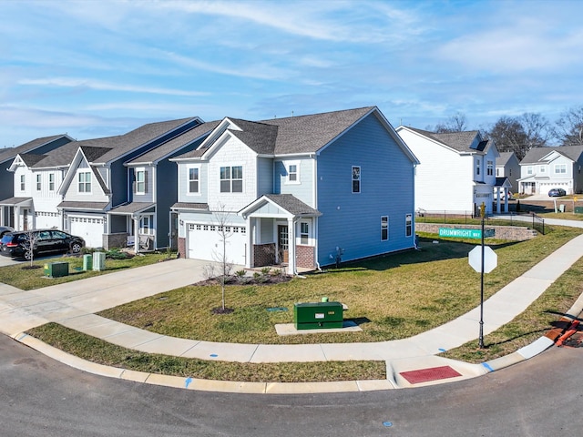 view of front of property with a garage and a front lawn