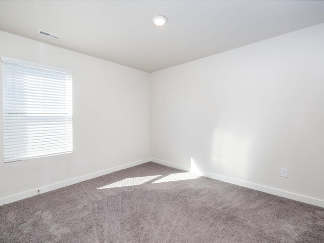 empty room with carpet floors