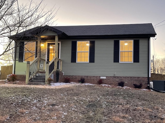 view of front of home with central air condition unit