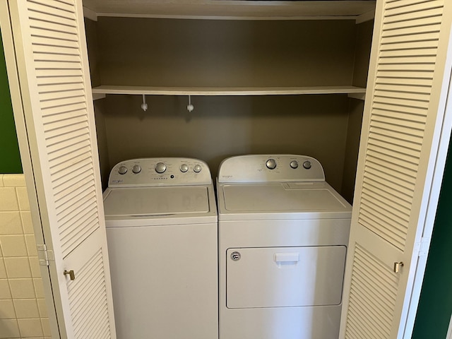 laundry area with washer and dryer