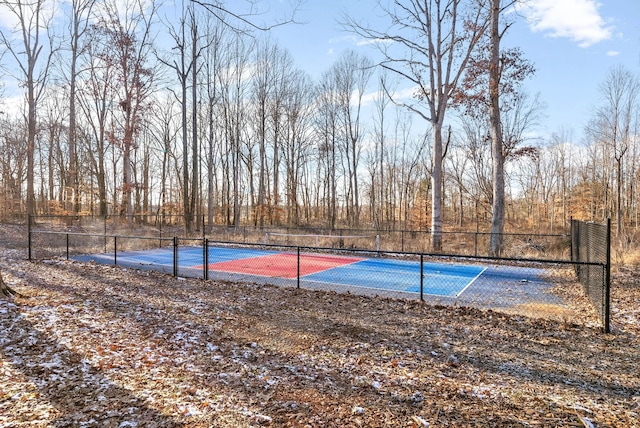 view of sport court with tennis court