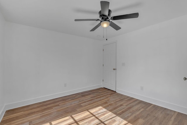 spare room featuring light hardwood / wood-style flooring