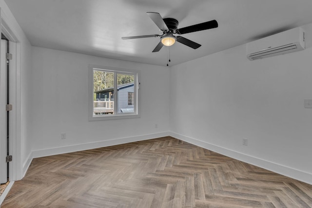 empty room featuring ceiling fan, light parquet floors, and a wall mounted air conditioner