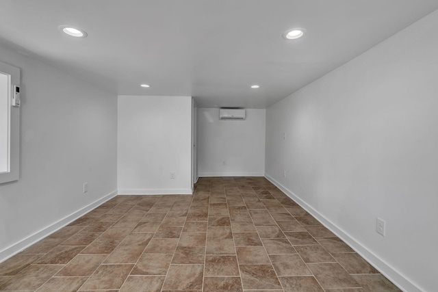 basement featuring an AC wall unit