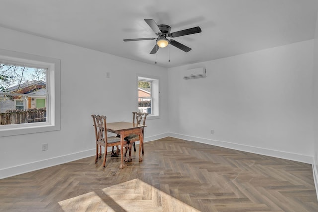 dining room with ceiling fan, dark parquet flooring, and a wall mounted AC