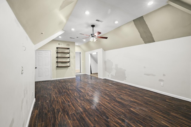 unfurnished living room featuring lofted ceiling, hardwood / wood-style floors, and ceiling fan