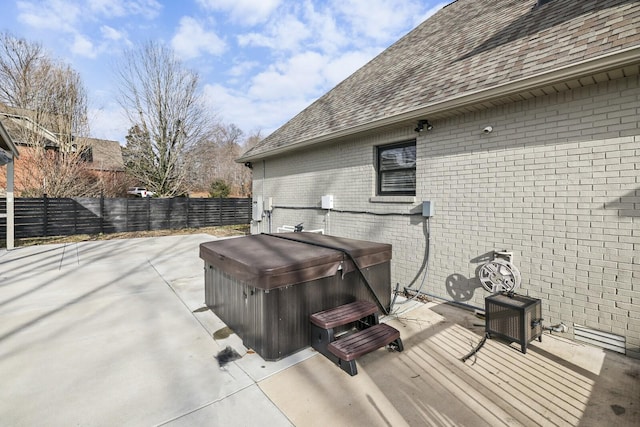 view of patio with a hot tub