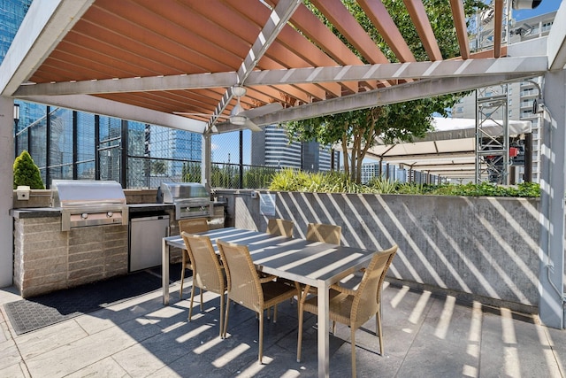 view of patio / terrace featuring grilling area, a pergola, and area for grilling