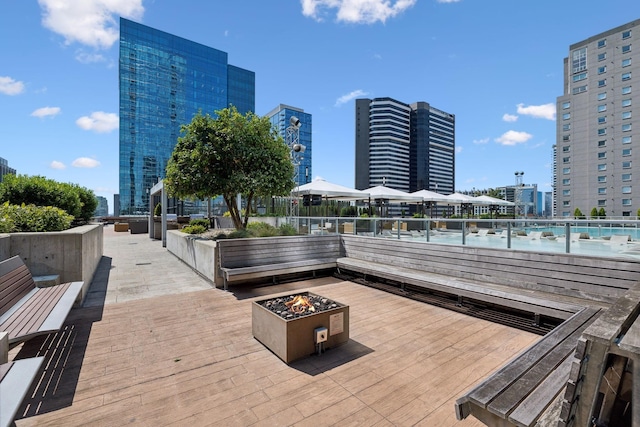 view of patio featuring an outdoor fire pit