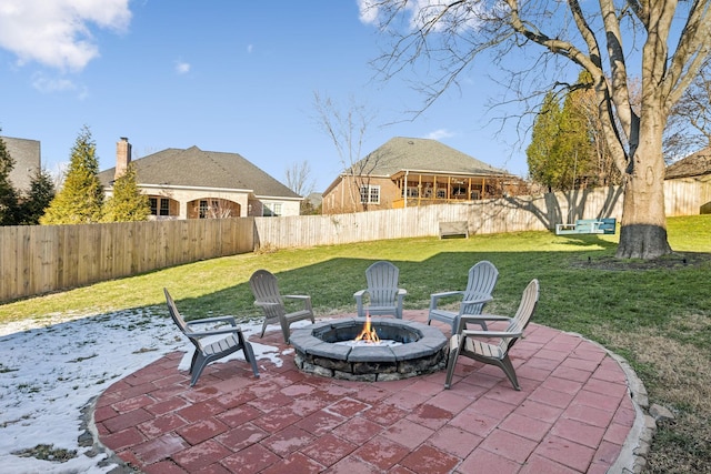 view of patio / terrace with an outdoor fire pit