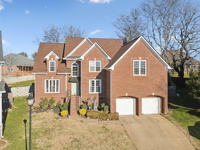 front of property featuring a garage and a front lawn