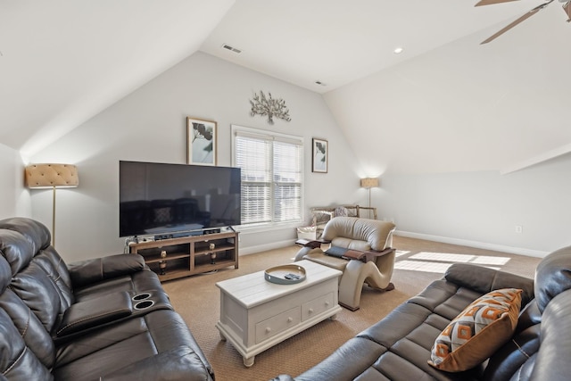 carpeted living room featuring vaulted ceiling and ceiling fan