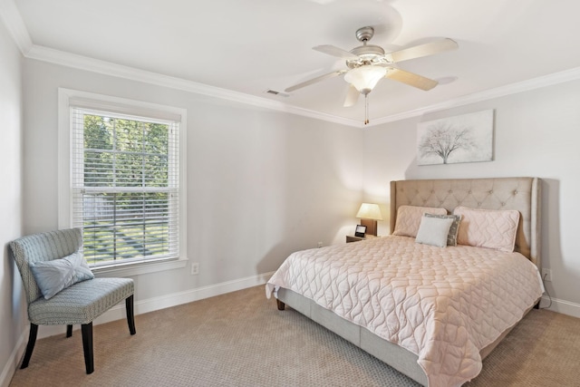 bedroom featuring ceiling fan, crown molding, and light colored carpet