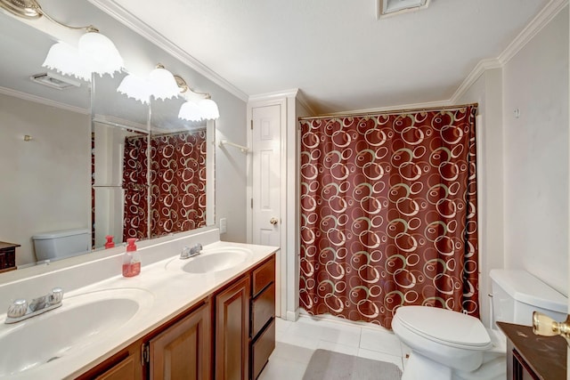 bathroom featuring tile patterned floors, vanity, ornamental molding, and toilet