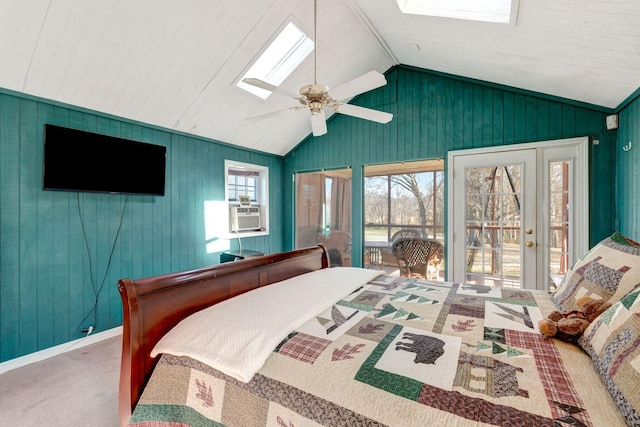 bedroom with carpet, ceiling fan, lofted ceiling with skylight, access to outside, and cooling unit