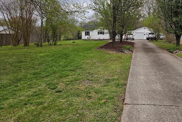 view of yard with a garage