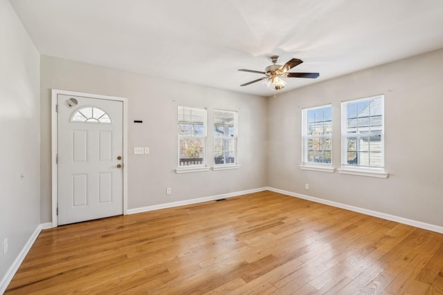 entrance foyer featuring ceiling fan and light wood-type flooring