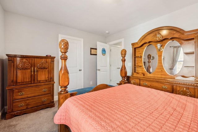 bedroom featuring light carpet