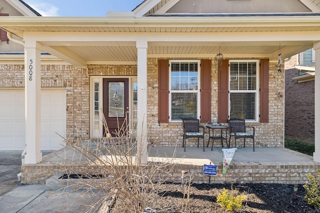 entrance to property with covered porch