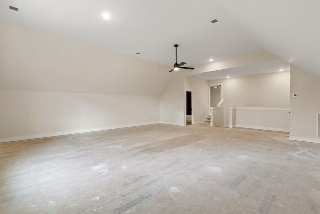 additional living space with ceiling fan and vaulted ceiling