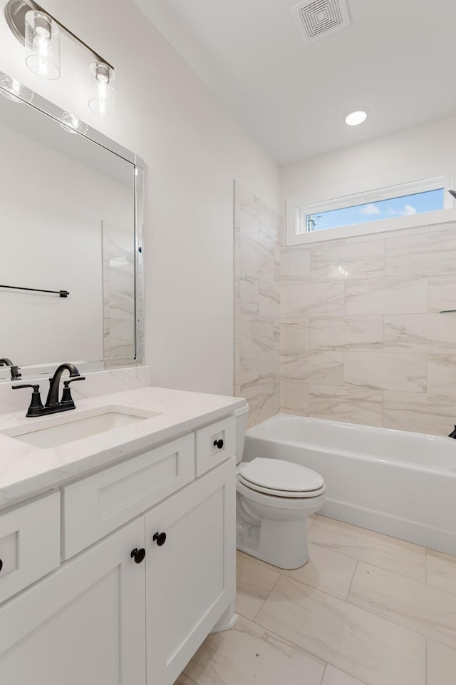 full bathroom with shower / bathtub combination, toilet, vanity, visible vents, and marble finish floor