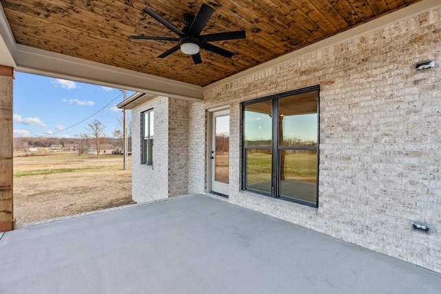 view of patio featuring a ceiling fan