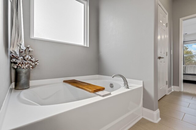 bathroom featuring a bathing tub