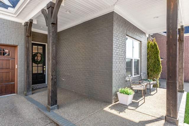 entrance to property with covered porch