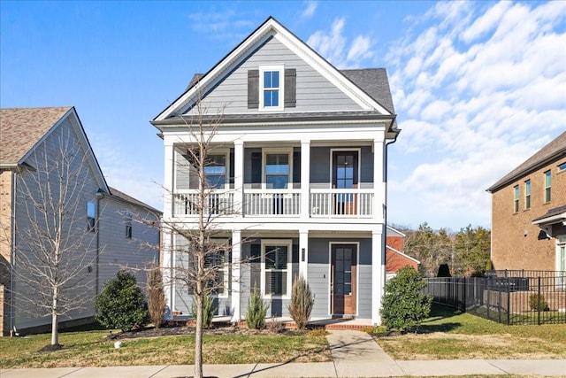 view of front of home with a balcony and covered porch