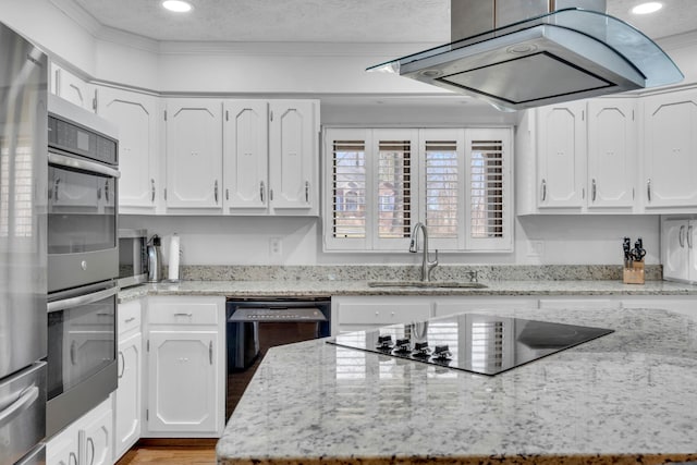 kitchen with sink, white cabinetry, black appliances, and island range hood