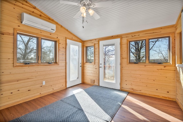 sunroom / solarium featuring an AC wall unit, ceiling fan, lofted ceiling, and wood ceiling