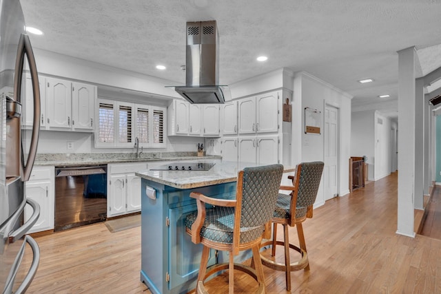 kitchen featuring a center island, black appliances, white cabinetry, island exhaust hood, and a breakfast bar area