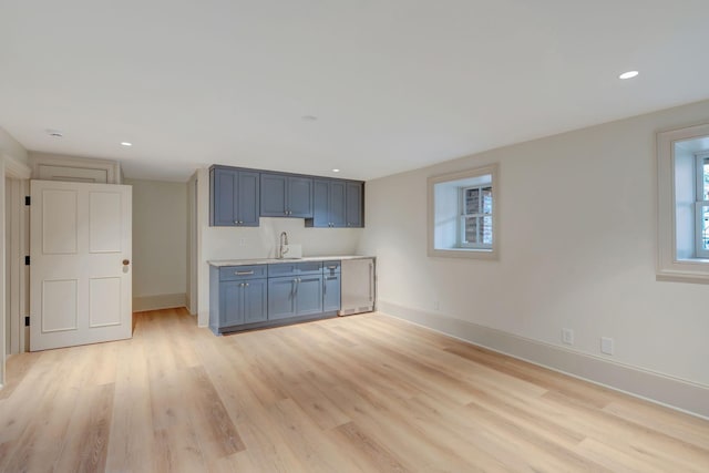 kitchen with sink and light wood-type flooring