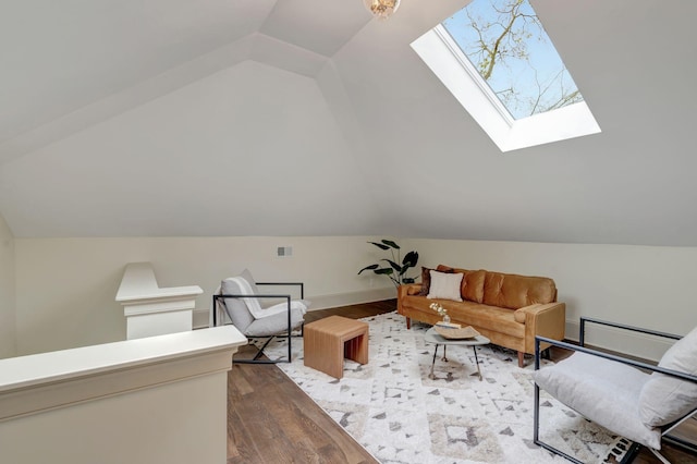 living area featuring dark hardwood / wood-style flooring and lofted ceiling with skylight