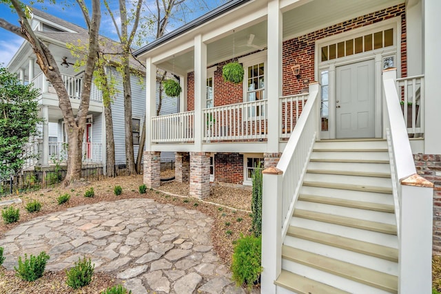 entrance to property with covered porch