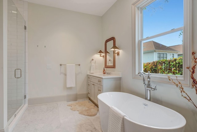 bathroom with vanity and separate shower and tub