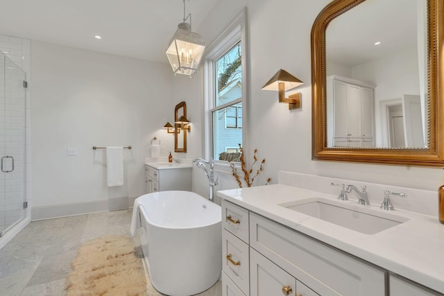 bathroom featuring vanity, shower with separate bathtub, a chandelier, and a wealth of natural light