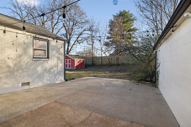 view of patio / terrace with a storage shed