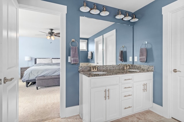 bathroom featuring vanity, ceiling fan, and tile patterned flooring