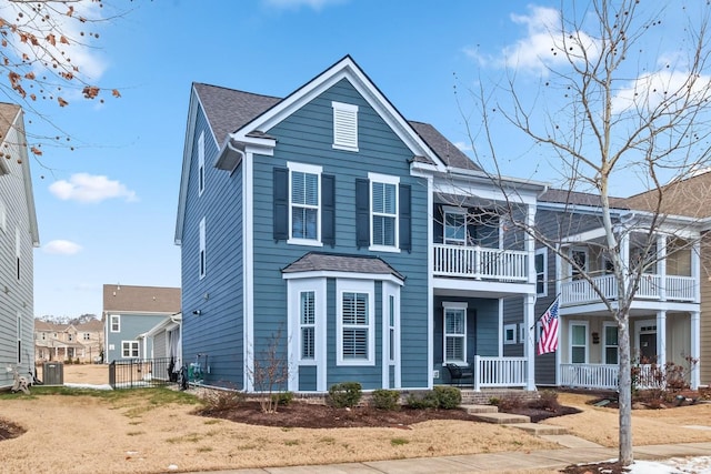 view of front of home with central air condition unit and a porch