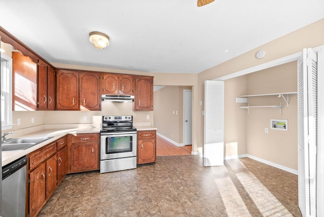 kitchen with sink and appliances with stainless steel finishes