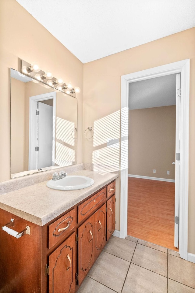 bathroom with vanity and tile patterned floors