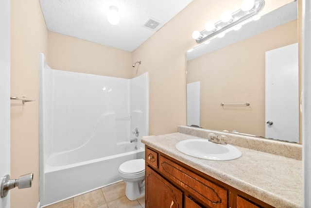 full bathroom with a textured ceiling, shower / bathing tub combination, tile patterned floors, vanity, and toilet