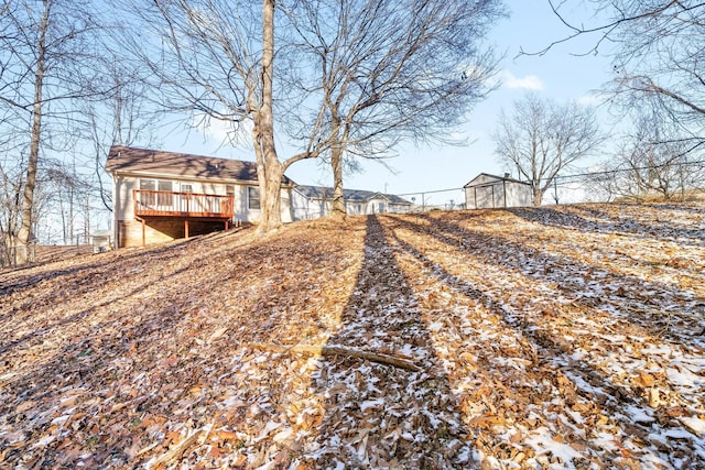 view of yard with a wooden deck